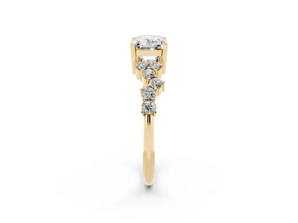 Emerald Cut Diamond Scattered Round Accent Ring with Prong Setting Yellow gold