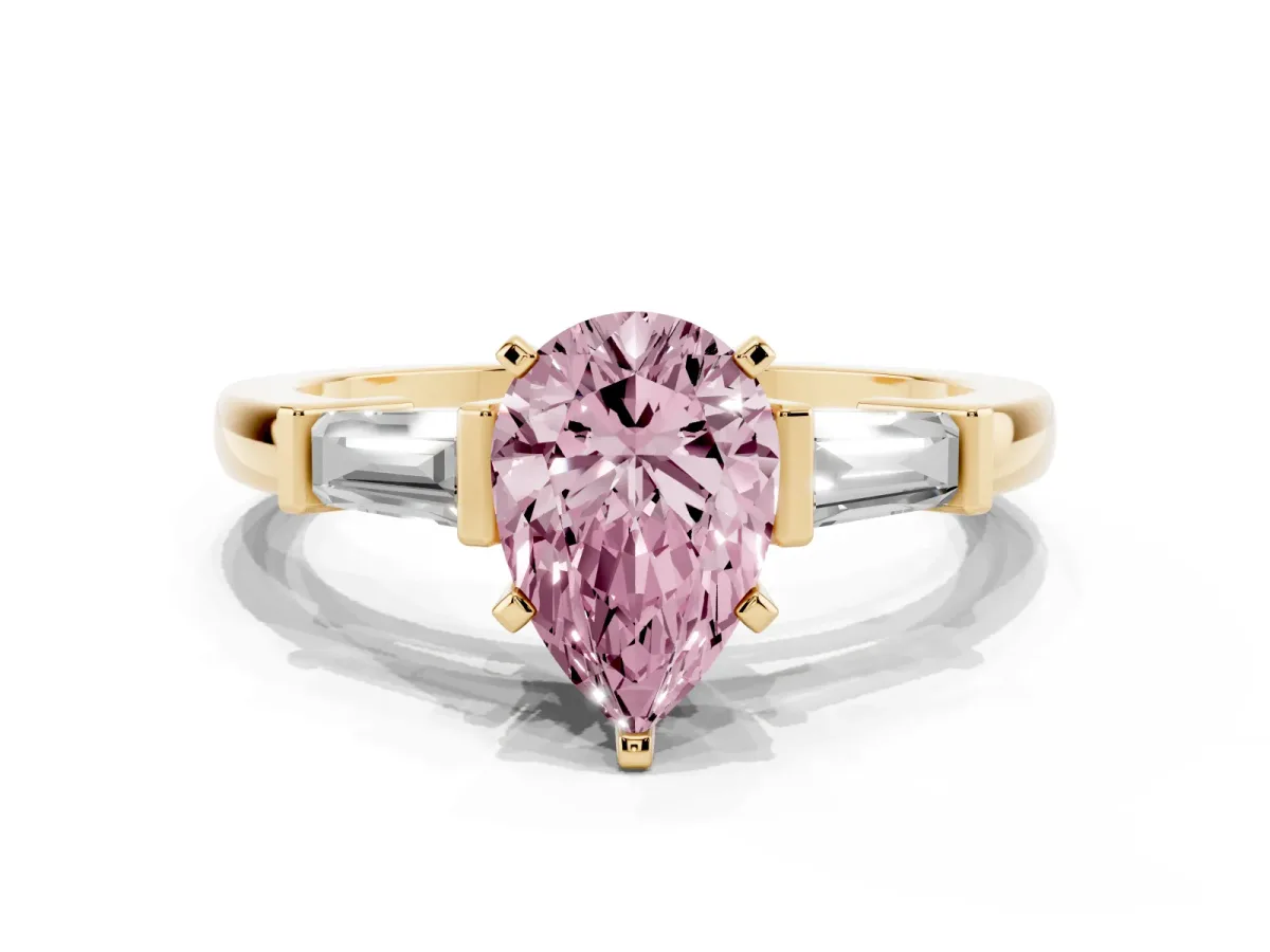 Fancy Pink Pear Cut Cut Diamond Solitaire Ring with Tapered Baguette Accents and Four-Prong Setting Yellow gold