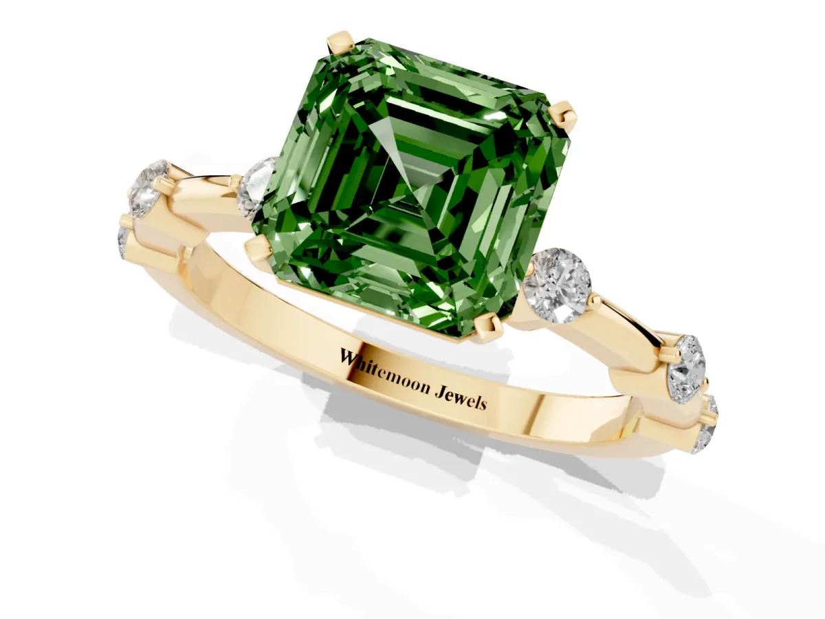 Fancy Green Asscher Cut Solitaire Diamond Ring with Bezel Set Side Stones and Prong Setting Yellow gold