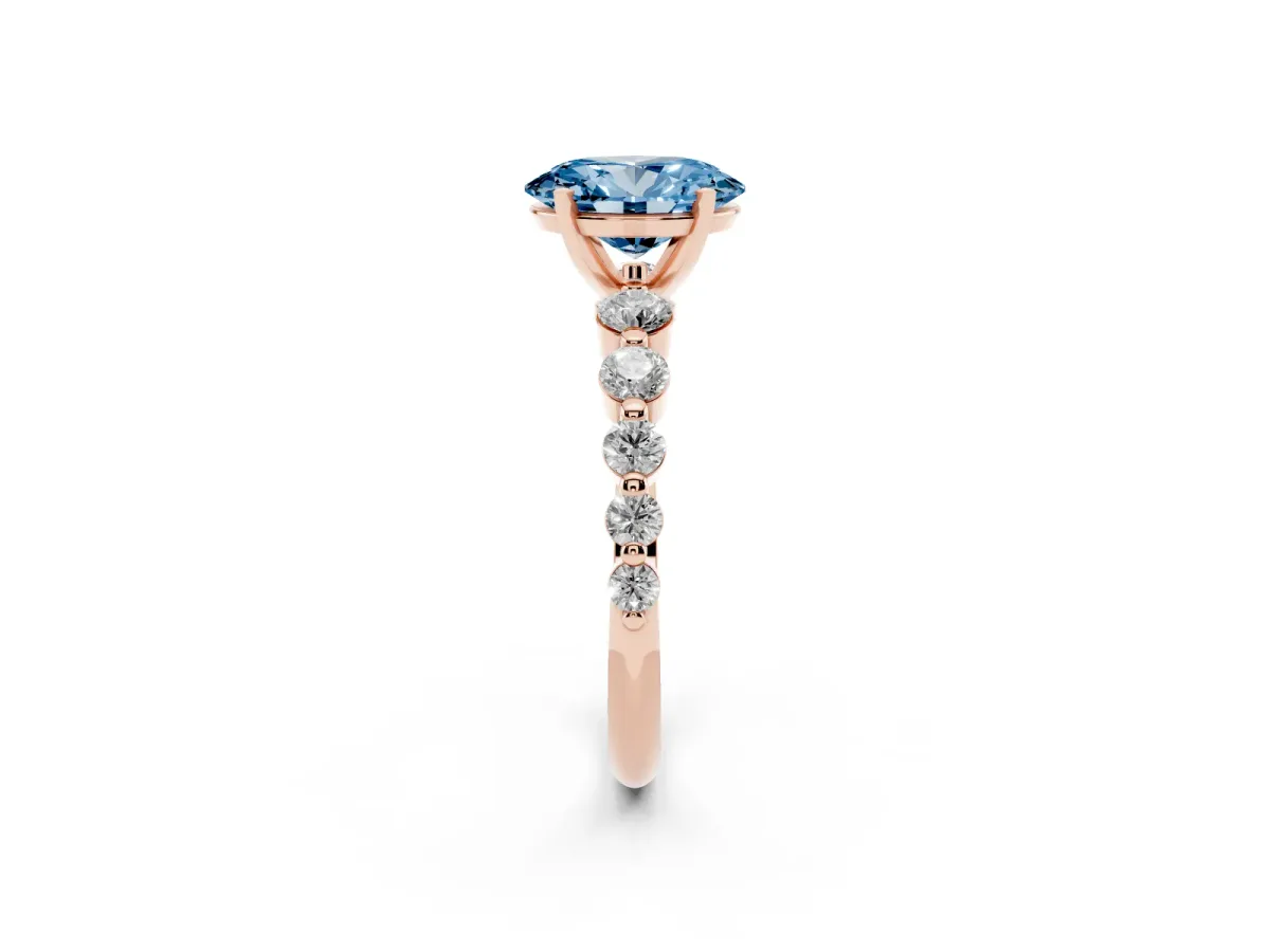 Fancy Blue Oval Cut Solitaire Diamond Ring with Pave Band and Four-Prong Setting Rose gold