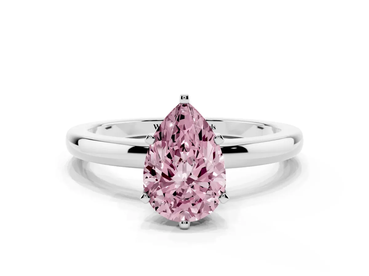 Fancy Pink Pear Cut Solitaire Diamond Ring with Six-Prong Setting on a Classic Band Silver
