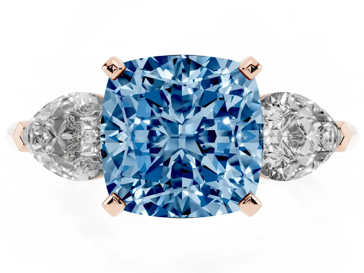 Fancy Blue Three-Stone Cushion Cut Diamond Ring with Pear Side Stones and Four-Prong Setting Rose gold