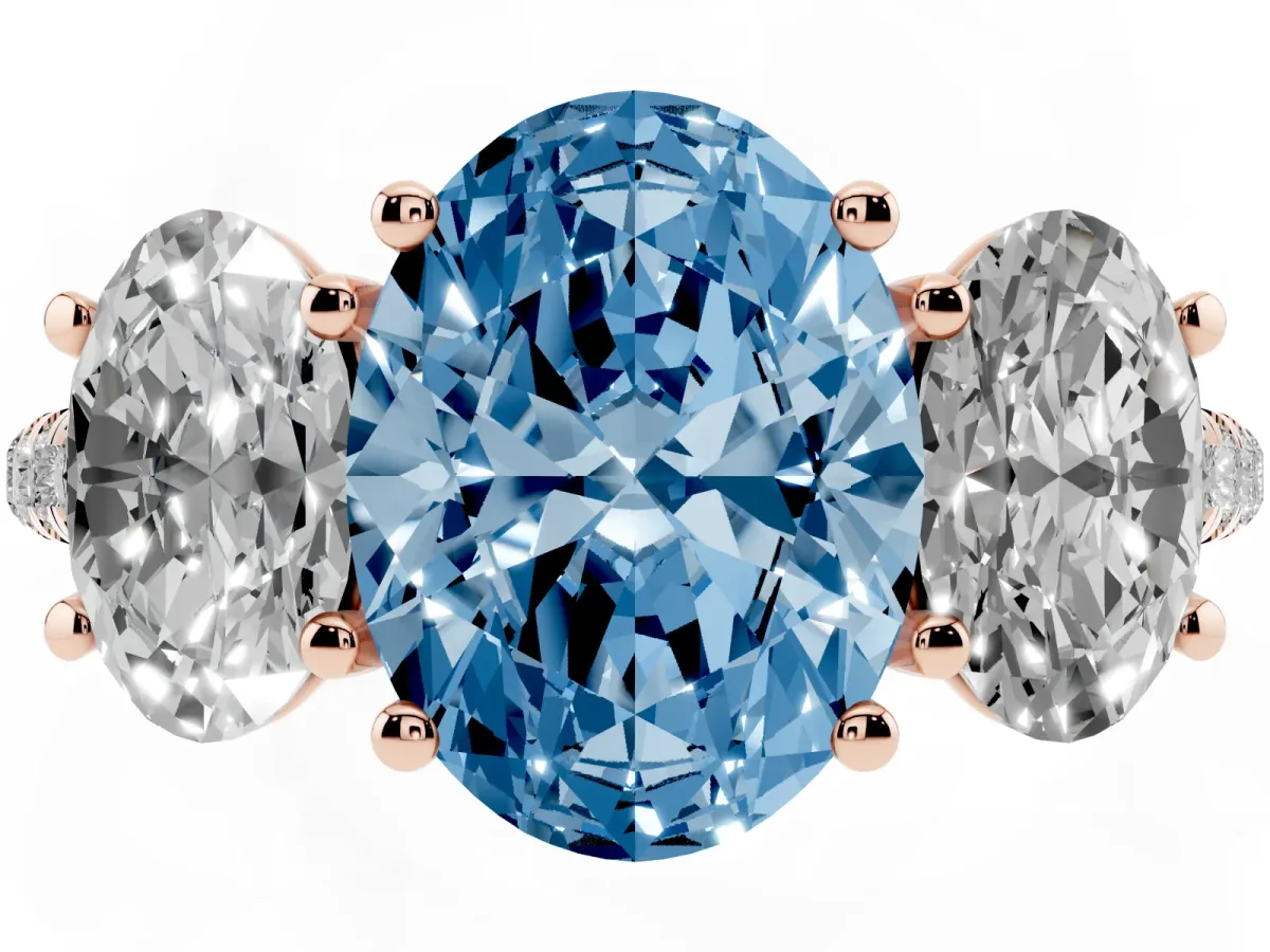 Fancy Blue Three-Stone Oval Cut Diamond Ring with Round Pavé Band and Prong Setting Rose gold
