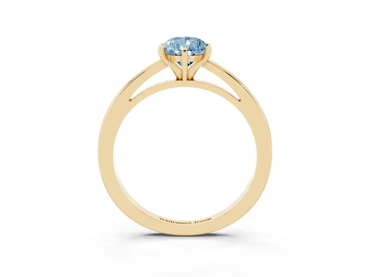 Fancy Blue Pear Cut Solitaire Diamond Engagement Ring with Four-Prong Setting on a Classic Band Yellow gold