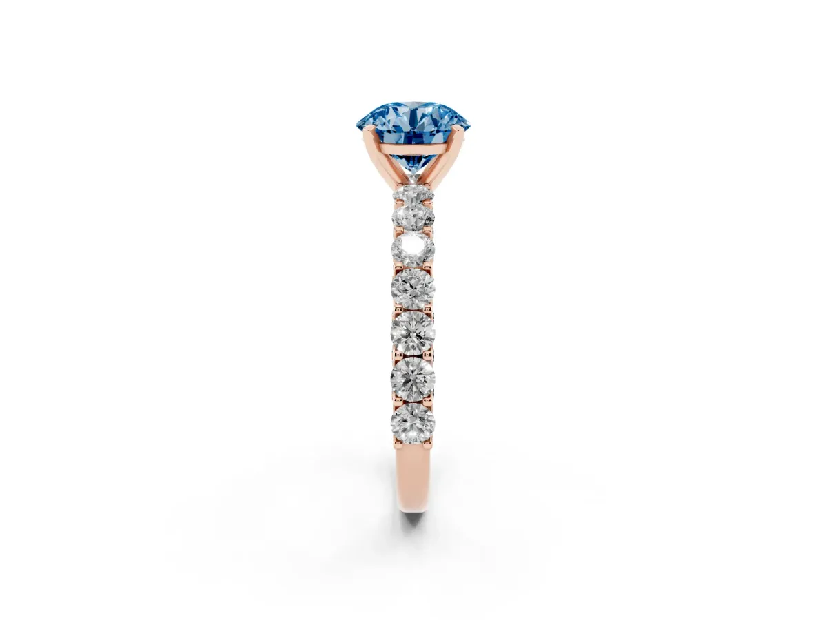 Fancy Blue Round Cut Diamond Solitaire Ring with Shared Prong Pavé Band and Four-Prong Setting Rose gold