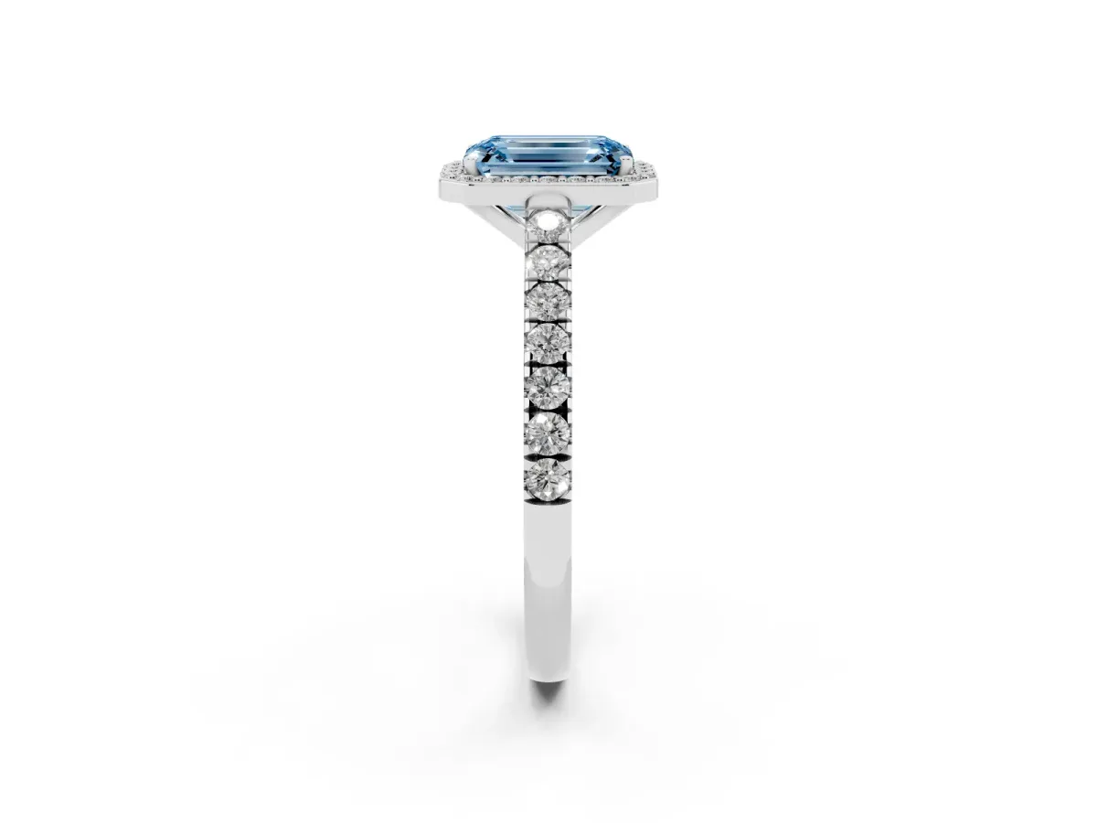 Fancy Blue Emerald Cut Cut Halo Diamond Engagement Ring with Pave Band and Four-Prong Setting White gold