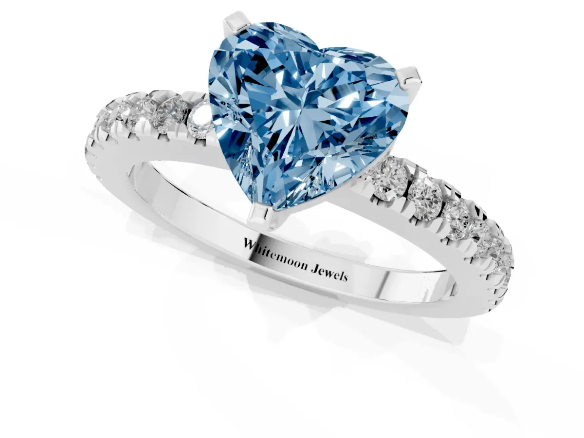 Fancy Blue Heart Cut Solitaire Diamond with Pavé Band and Four-Prong Setting Silver