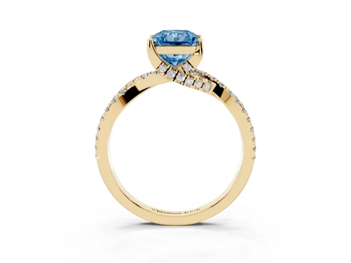 Fancy Blue Radiant Cut Solitaire Twist Pave Diamond Engagement Ring with Prong Setting Yellow gold