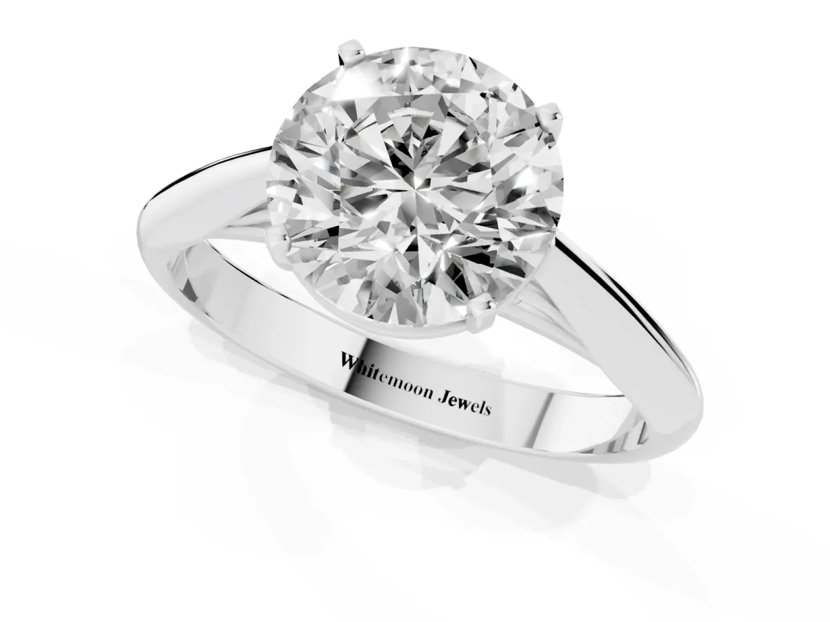 Round Cut Diamond Solitaire Engagement Ring with Cathedral Setting and Four-Prong Mount White gold