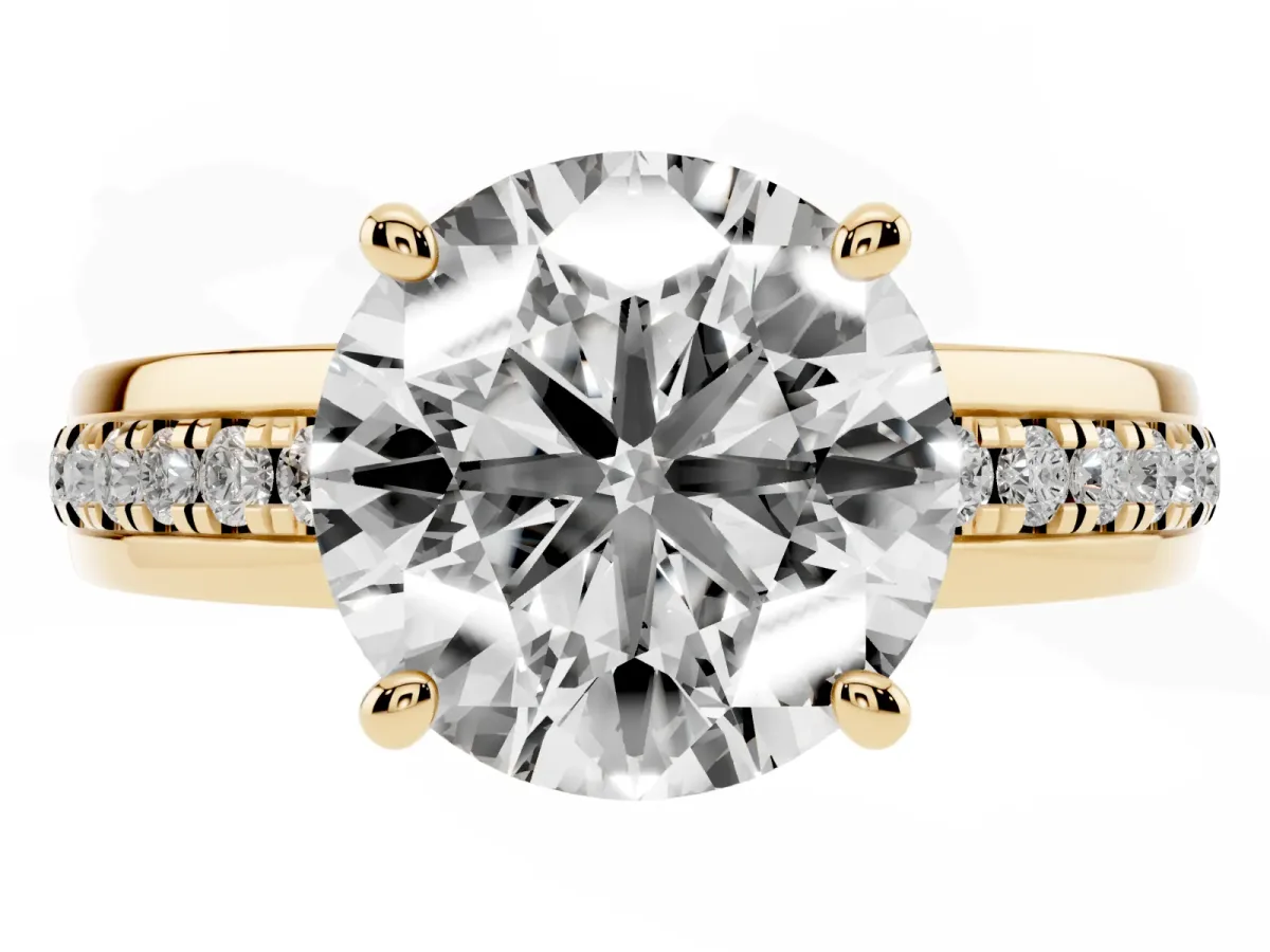 Round Cut Solitaire Diamond Ring with Channel Set Band and Six-Prong Setting Yellow gold