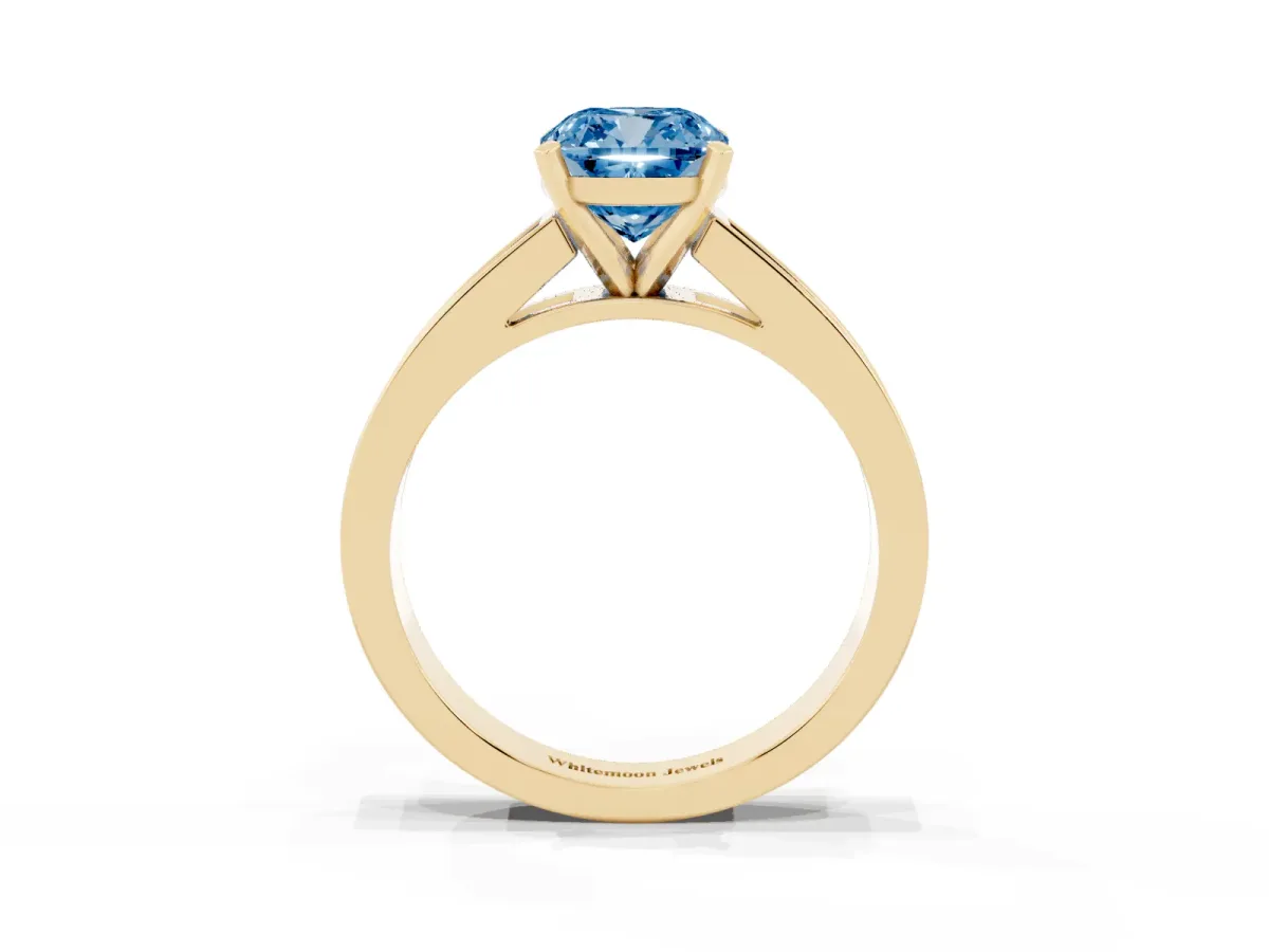 Fancy Blue Cushion Cut Solitaire Diamond Ring with Channel-Set Band and Four-Prong Setting Yellow gold
