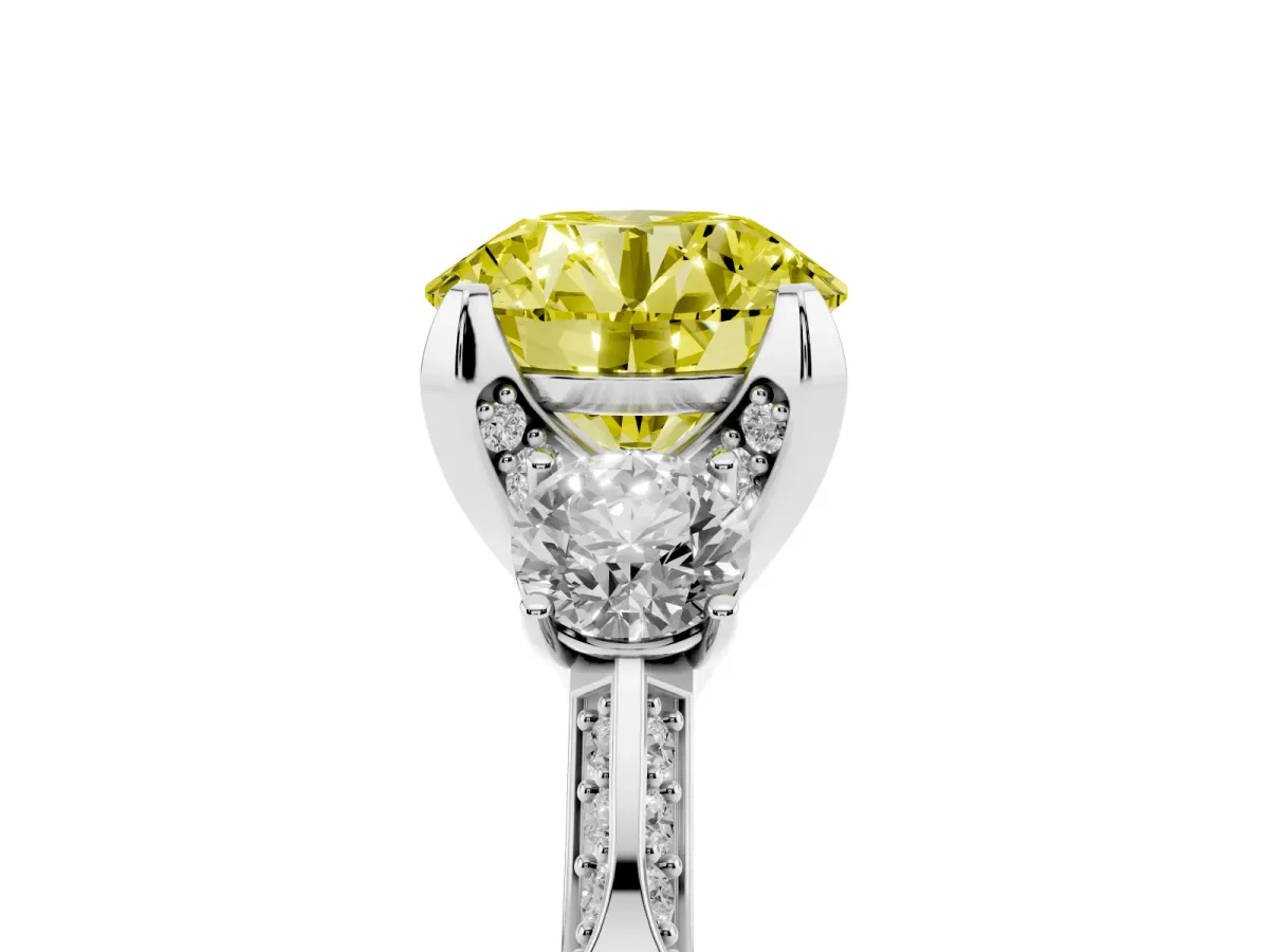 Fancy Yellow Round Cut Brilliant Three-Stone Diamond Ring with Pavé Band and Four-Prong Setting Platinum