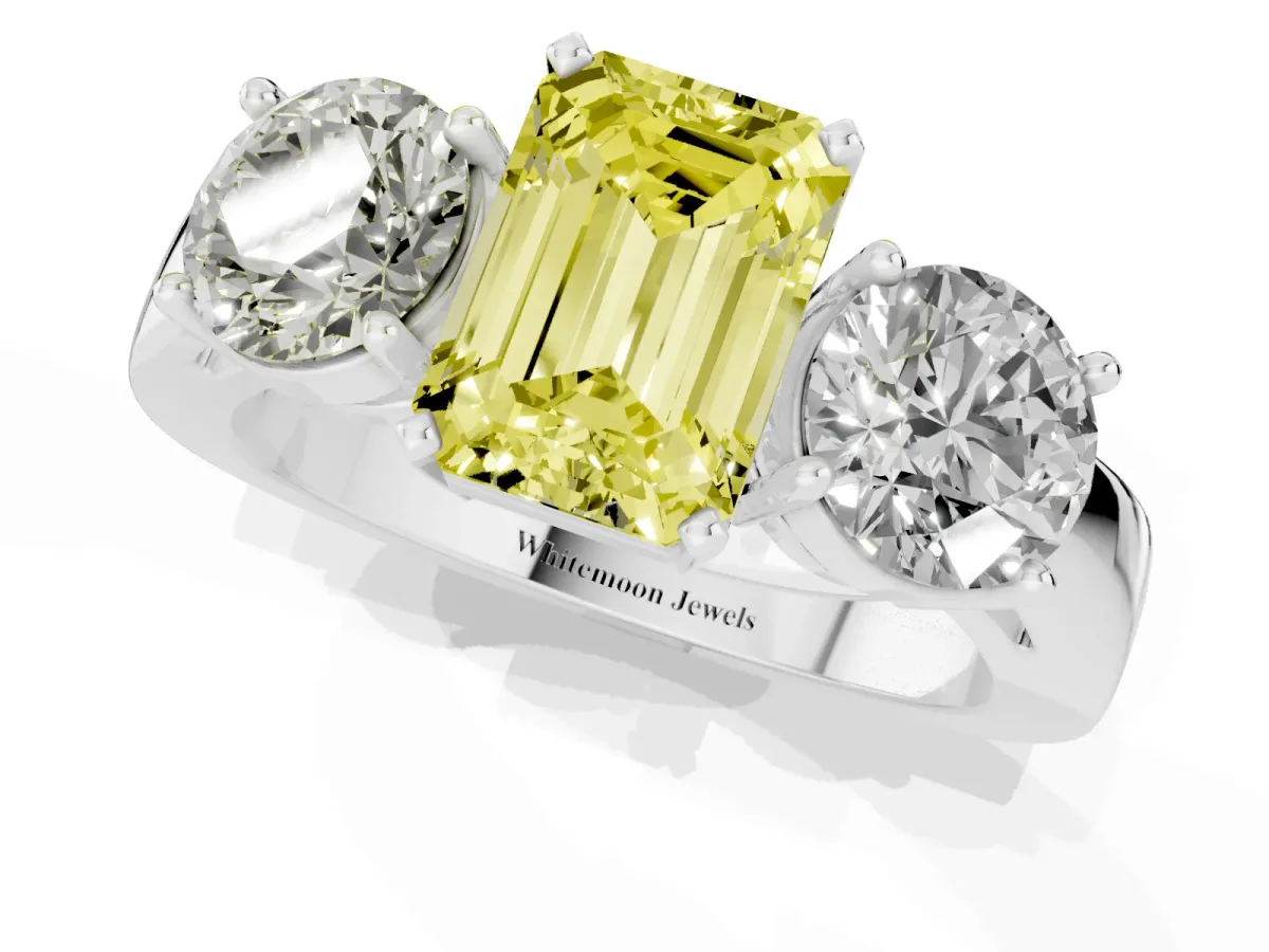 Fancy Yellow Three-Stone Emerald Cut Diamond Ring with Round Side Stones, Classic Band, and Four-Prong Setting Silver