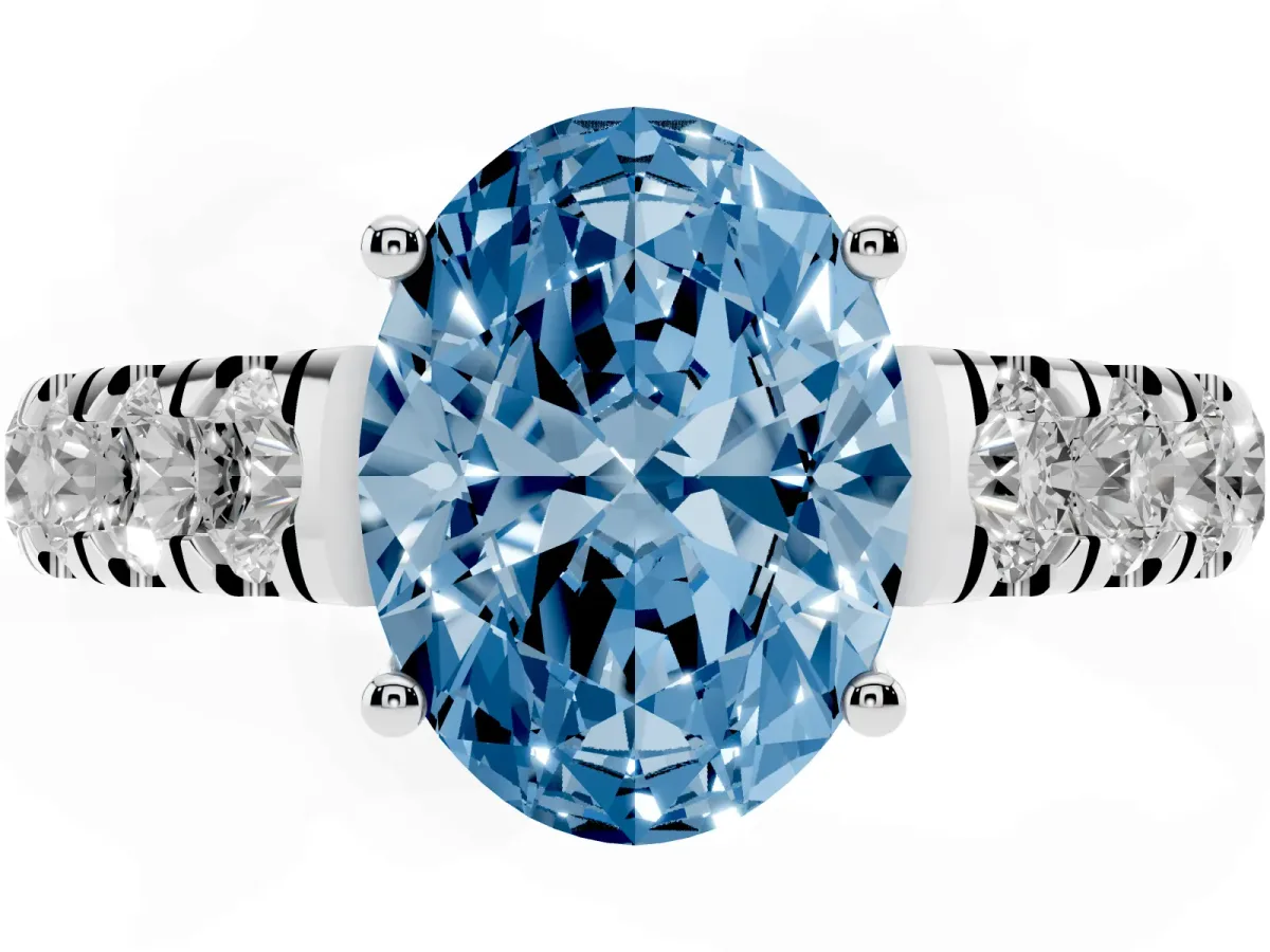 Fancy Blue Oval Cut Cut Diamond Solitaire Ring with Micro Pave Band and Prong Setting Silver