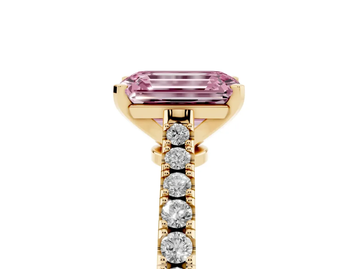 Fancy Pink Emerald Cut Cut Solitaire Diamond Engagement Ring with Pave Band and Four-Prong Setting Yellow gold