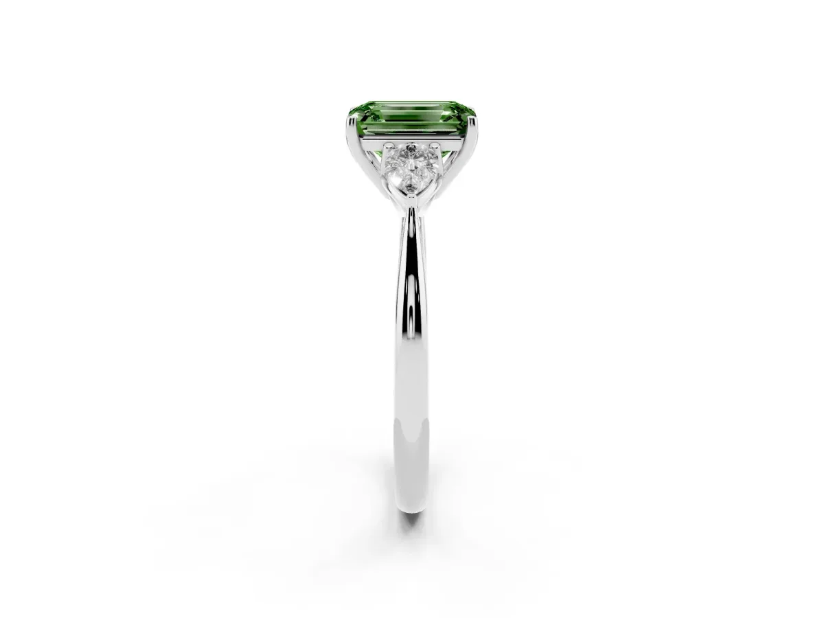 Fancy Green Three-Stone Emerald Cut Diamond Ring with Pear Side Stones in Four-Prong Setting Silver