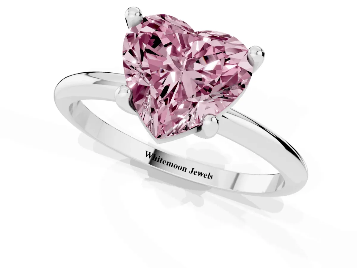Fancy Pink Heart Cut Solitaire Diamond Ring with 4-Prong Setting on a Classic Band Silver