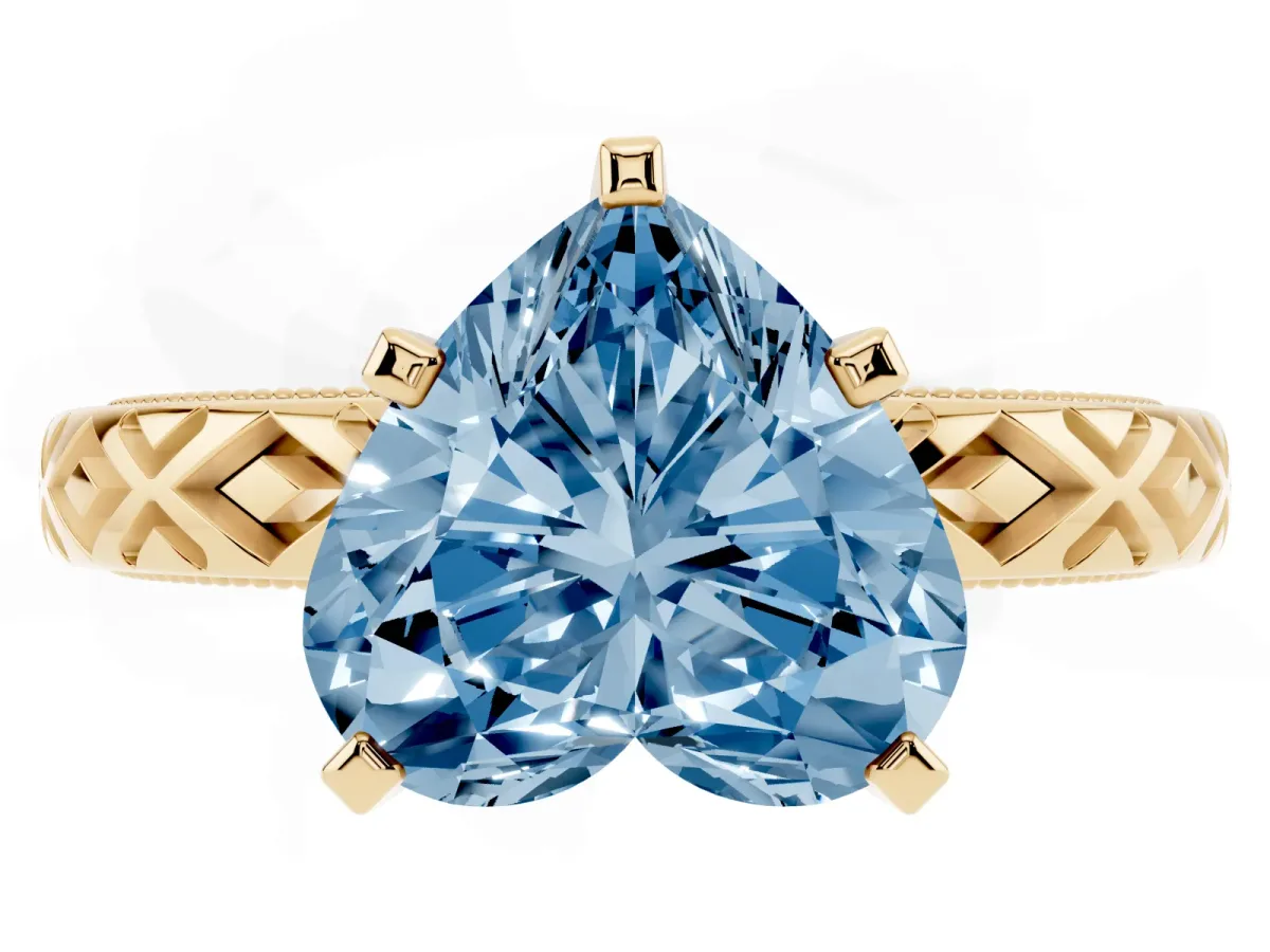 Fancy Blue Heart Cut Solitaire Diamond Ring with Milgrain and Black Enamel X Pattern Band Yellow gold