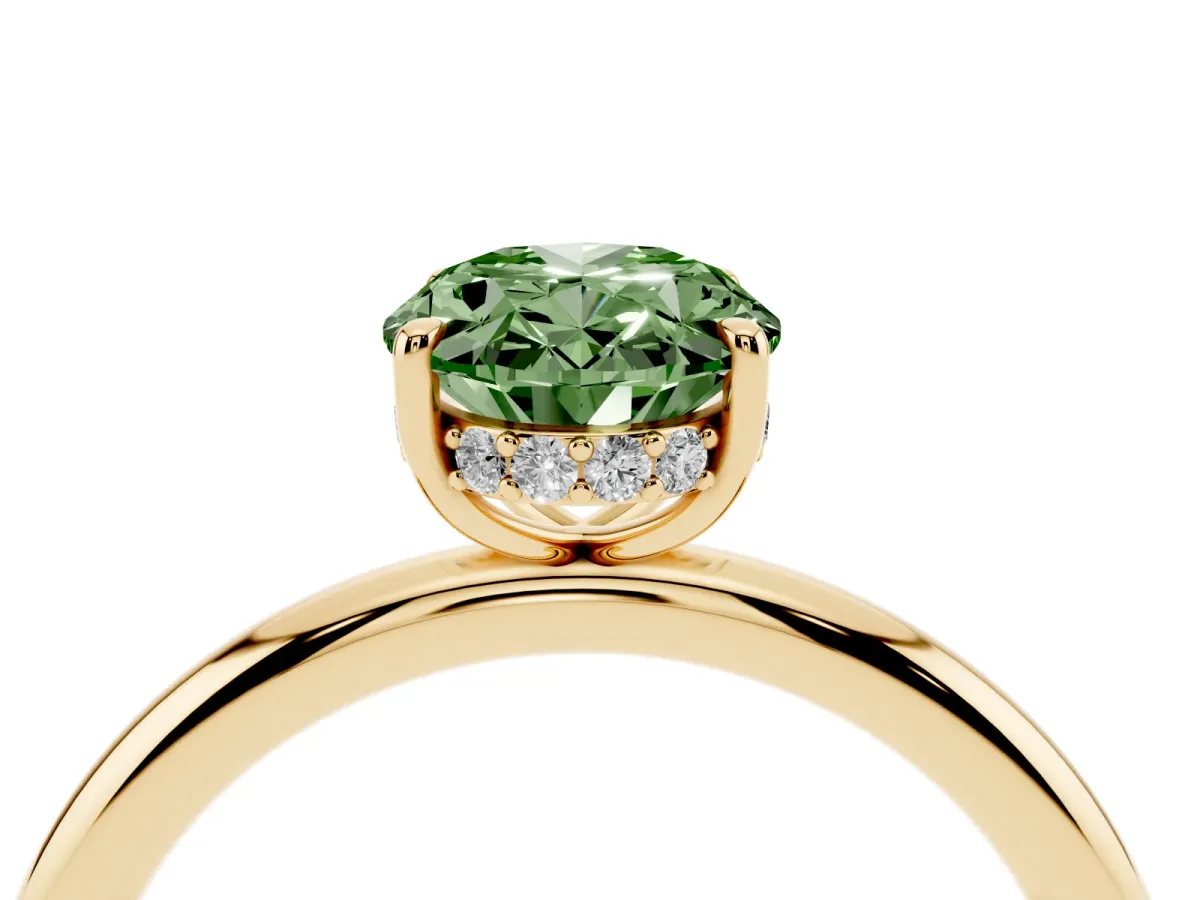 Fancy Green Oval Cut Diamond Solitaire Ring with Thin Band and Four-Prong Setting Yellow gold