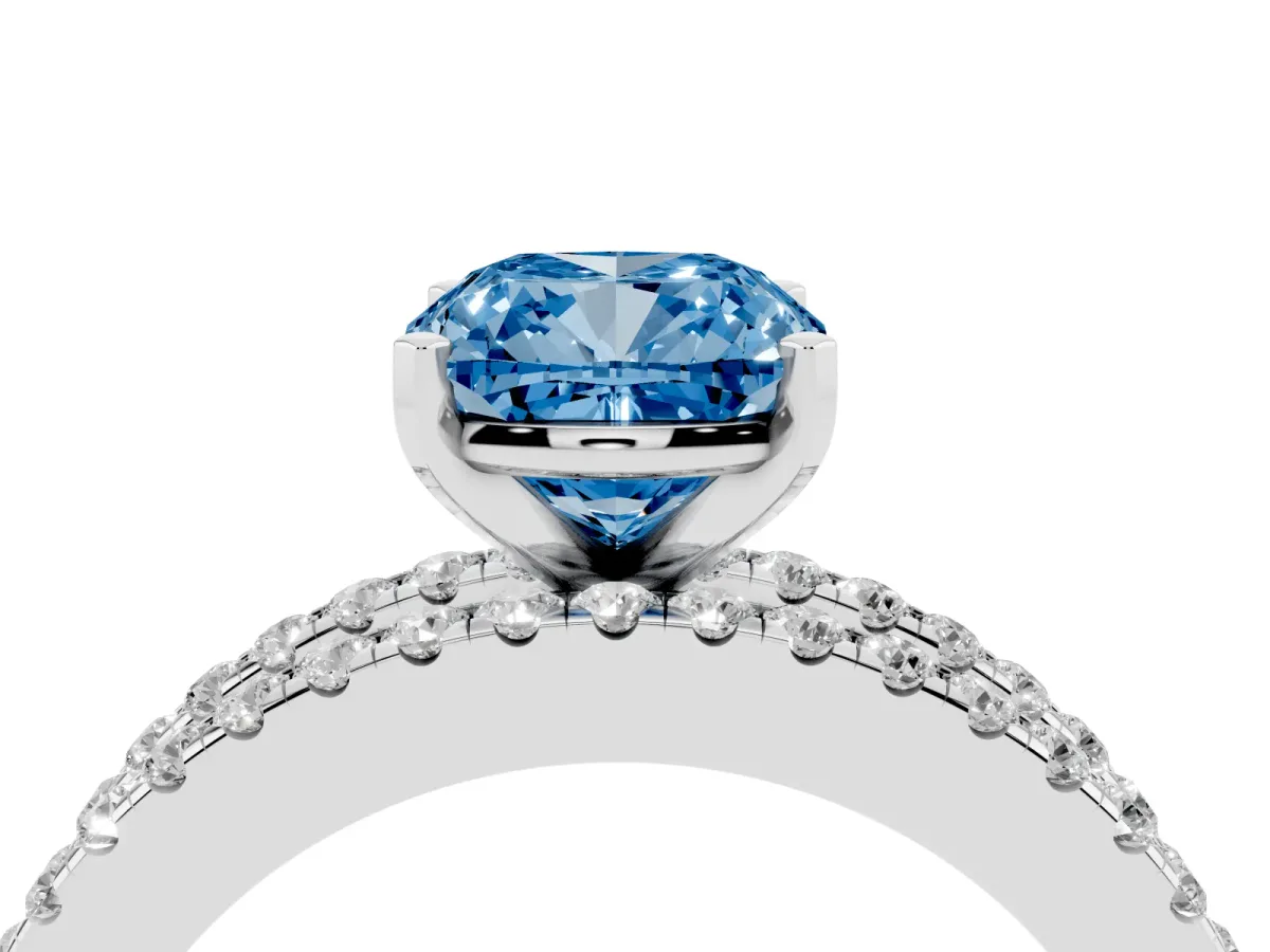 Fancy Blue Cushion Cut Diamond Solitaire Ring with Pavé and Channel Set Band Silver