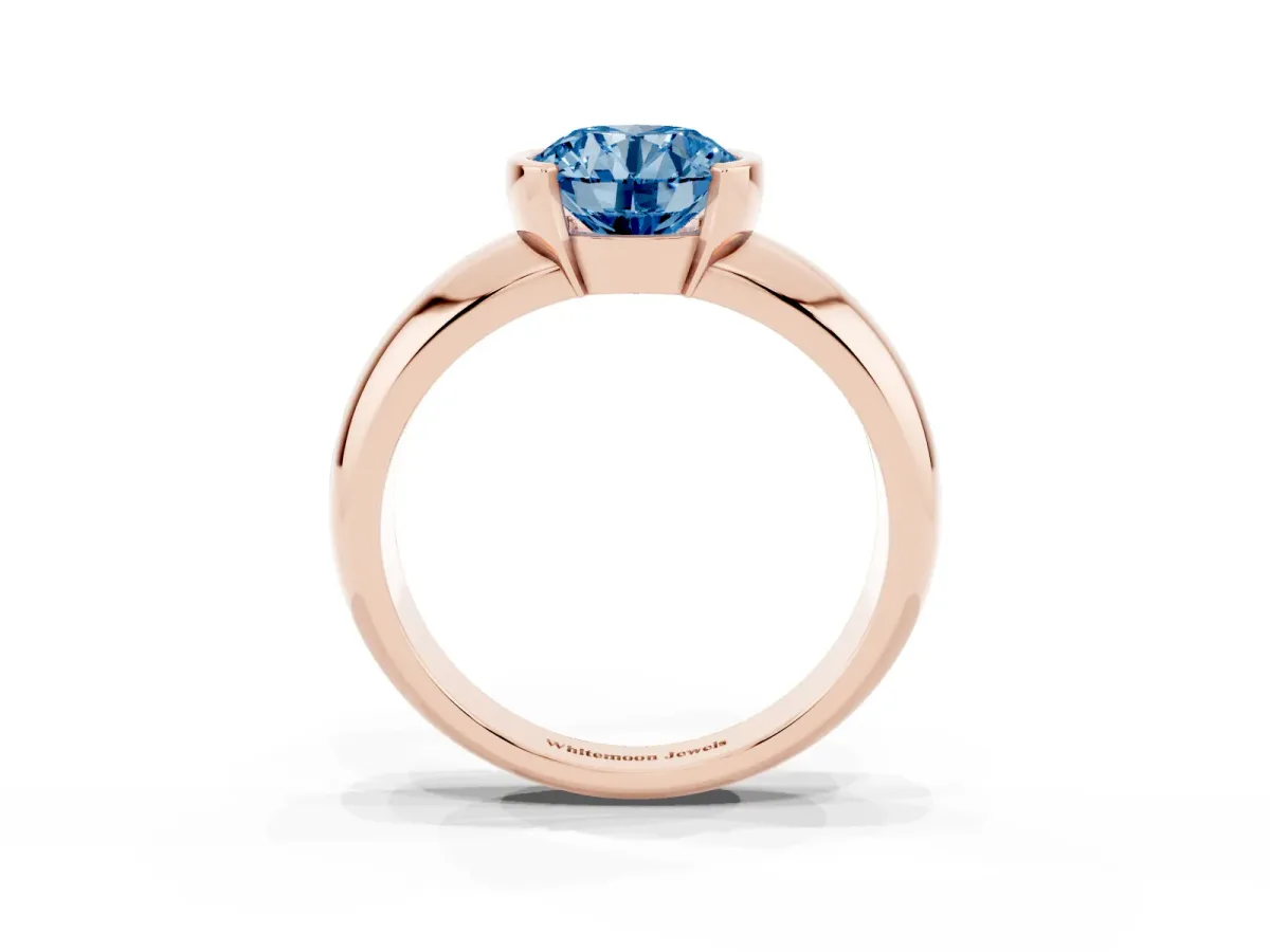 Fancy Blue Round Cut Solitaire Tension Set Diamond Ring with Wide Band Rose gold