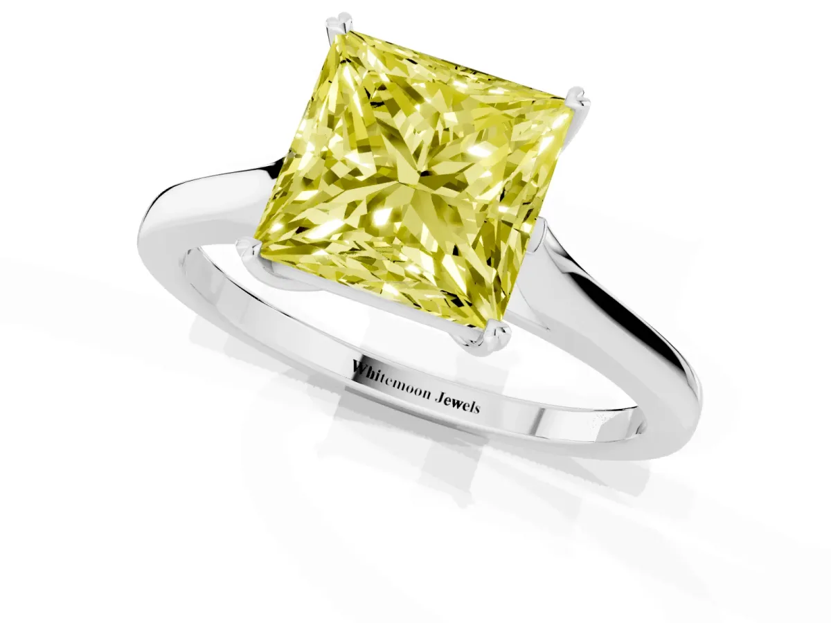 Fancy Yellow Princess Cut Solitaire Heart Prong Engagement Ring with Tapered Band Platinum