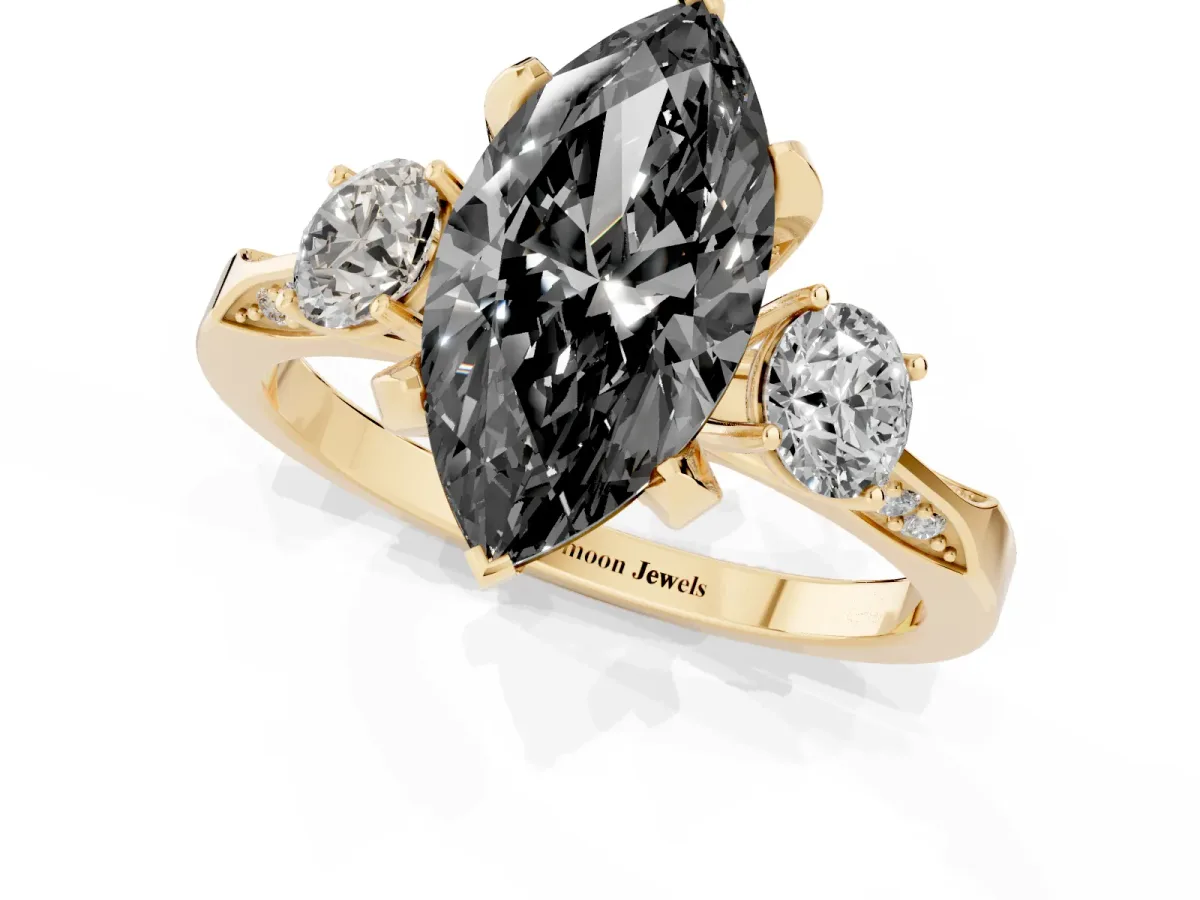 Fancy Black Marquise Cut Brilliant Three-Stone Diamond Ring with Pavé Band and Four-Prong Setting Yellow gold