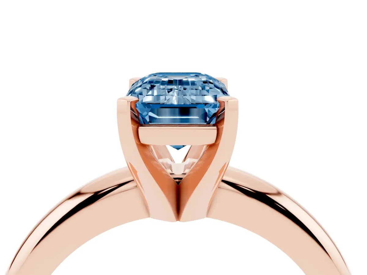 Fancy Blue Emerald Cut Diamond Solitaire Engagement Ring with Round Band and Four-Prong Setting Rose gold
