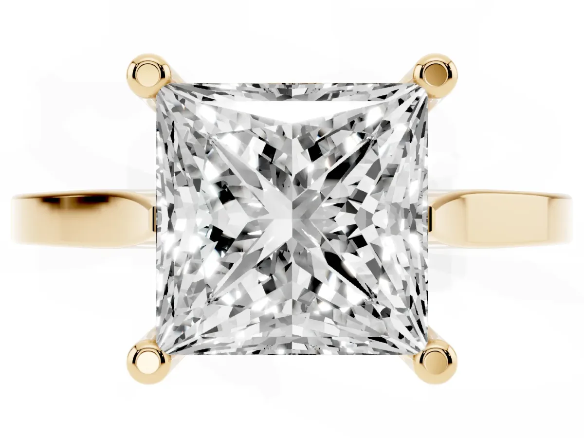 Princess Cut Solitaire Diamond Ring with Four-Prong Setting and Tapered Band Yellow gold