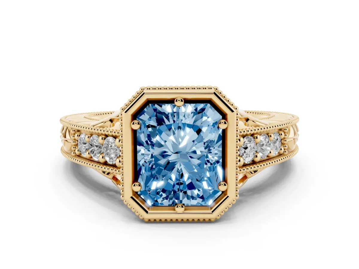 Fancy Blue Bezel Set Radiant Cut Diamond Milgrain Pave Engagement Ring Yellow gold