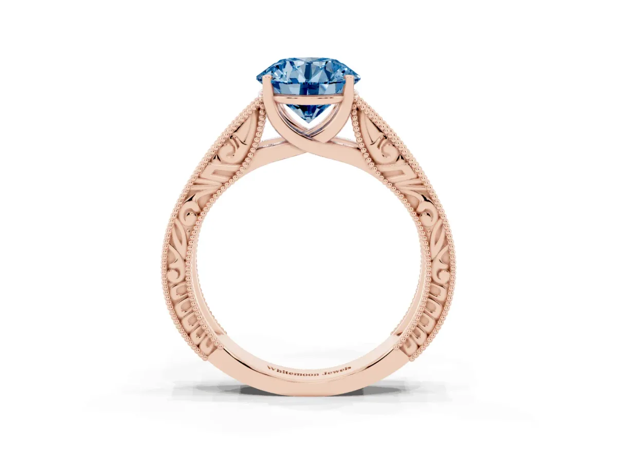 Fancy Blue Round Cut Diamond Solitaire Ring with Engraved Band and Four-Prong Setting Rose gold