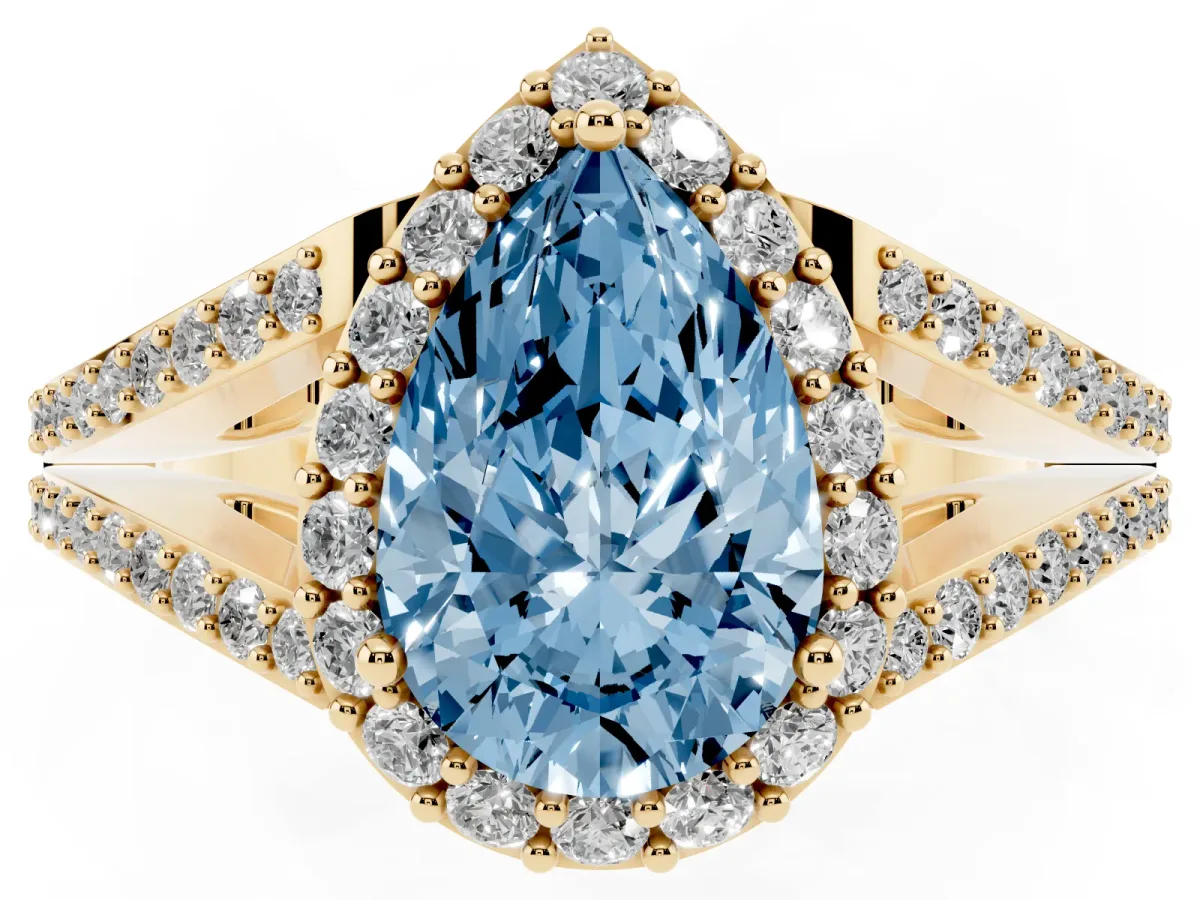 Fancy Blue Pear Cut Halo Split Shank Diamond Ring with Prong Setting Yellow gold