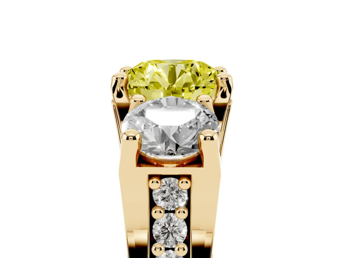 Fancy Yellow Round Cut Diamond Three-Stone Ring with Channel Set Band and Four-Prong Setting Yellow gold