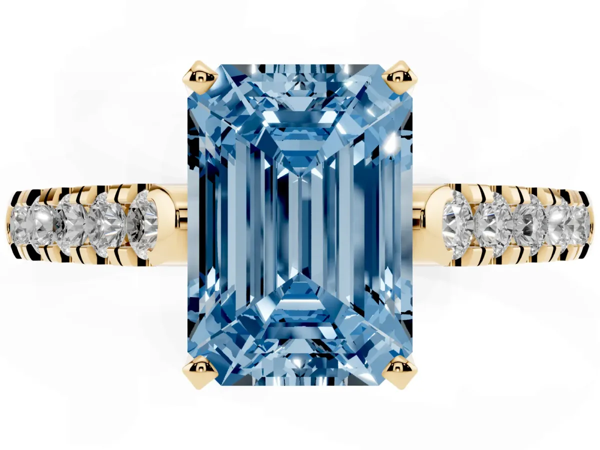Fancy Blue Emerald Cut Diamond Pavé Band Solitaire Ring with Prong Setting Yellow gold