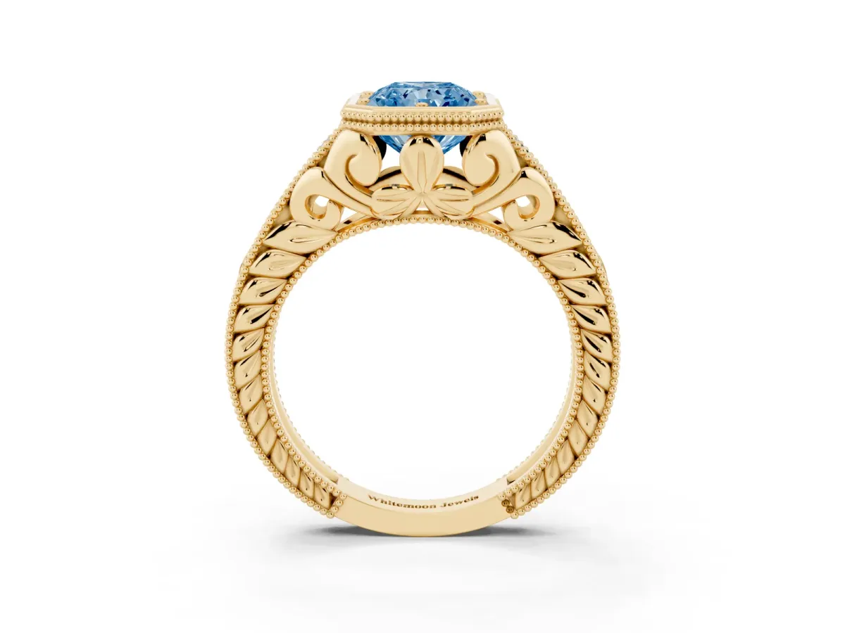 Fancy Blue Bezel Set Radiant Cut Diamond Milgrain Pave Engagement Ring Yellow gold