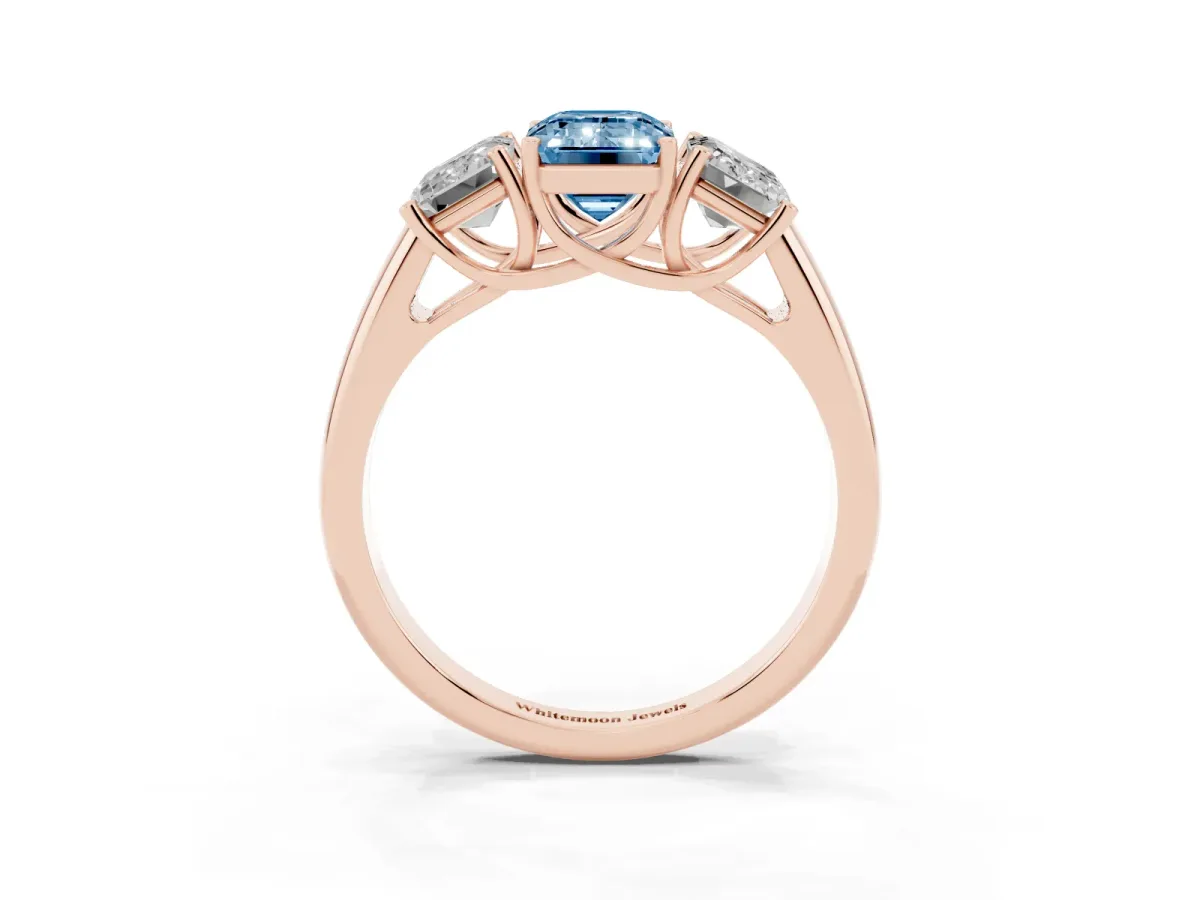 Fancy Blue Three-Stone Emerald Cut Diamond Engagement Ring with Prong Setting Rose gold