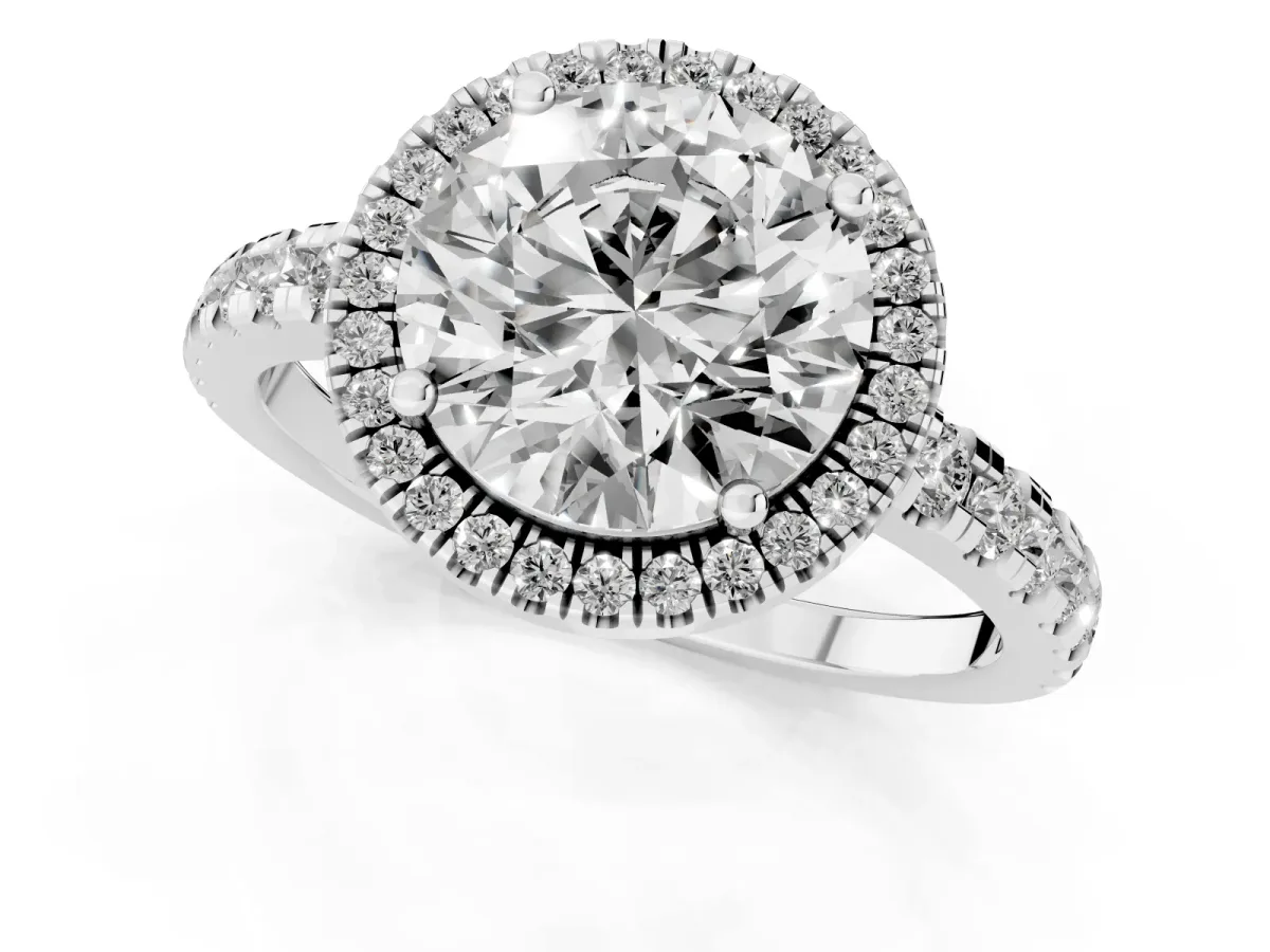 Round Cut Diamond Halo Ring with Pavé Band and Four-Prong Setting Platinum