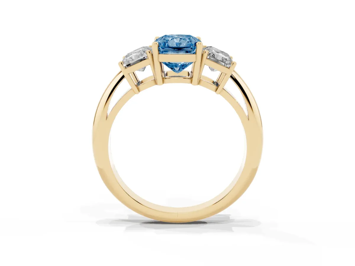 Fancy Blue Three-Stone Radiant Cut Cut Diamond Engagement Ring with Prong Setting on a White Gold Band Yellow gold