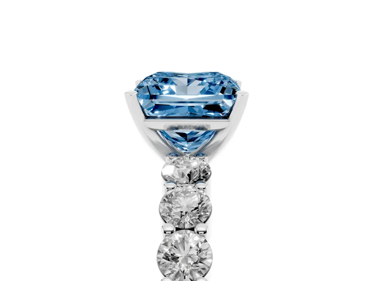 Fancy Blue Princess Cut Diamond Solitaire Ring with Shared Prong Round Side Stones Platinum