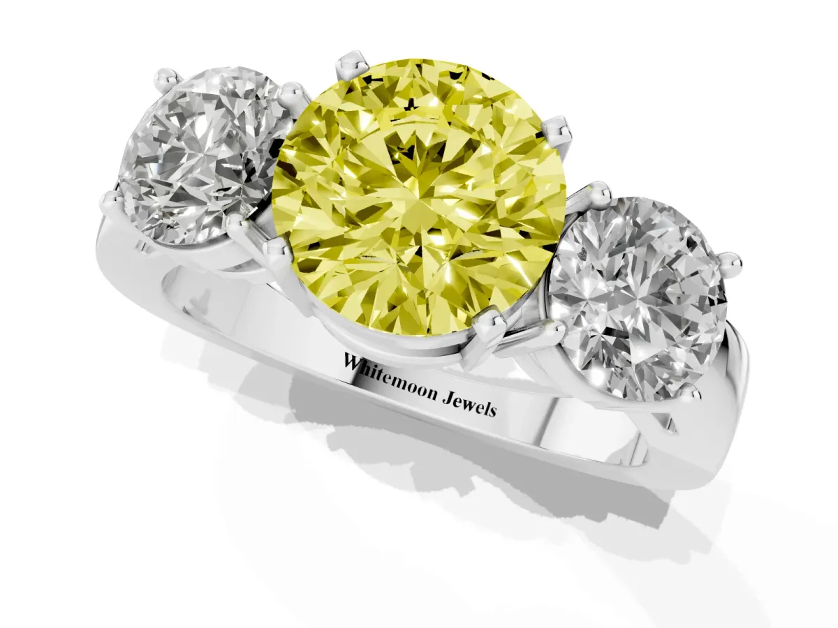 Fancy Yellow Three-Stone Round Cut Diamond Ring with Round Side Stones, Classic Band, and Four-Prong Setting White gold