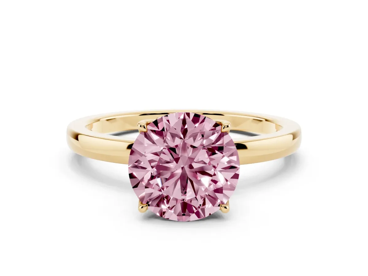 Fancy Pink Round Cut Diamond Solitaire Ring with Thin Band and Prong Setting Yellow gold
