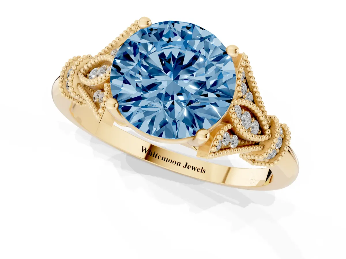 Fancy Blue Round Cut Diamond Solitaire Ring with Floral Filigree and Pave Accents Yellow gold