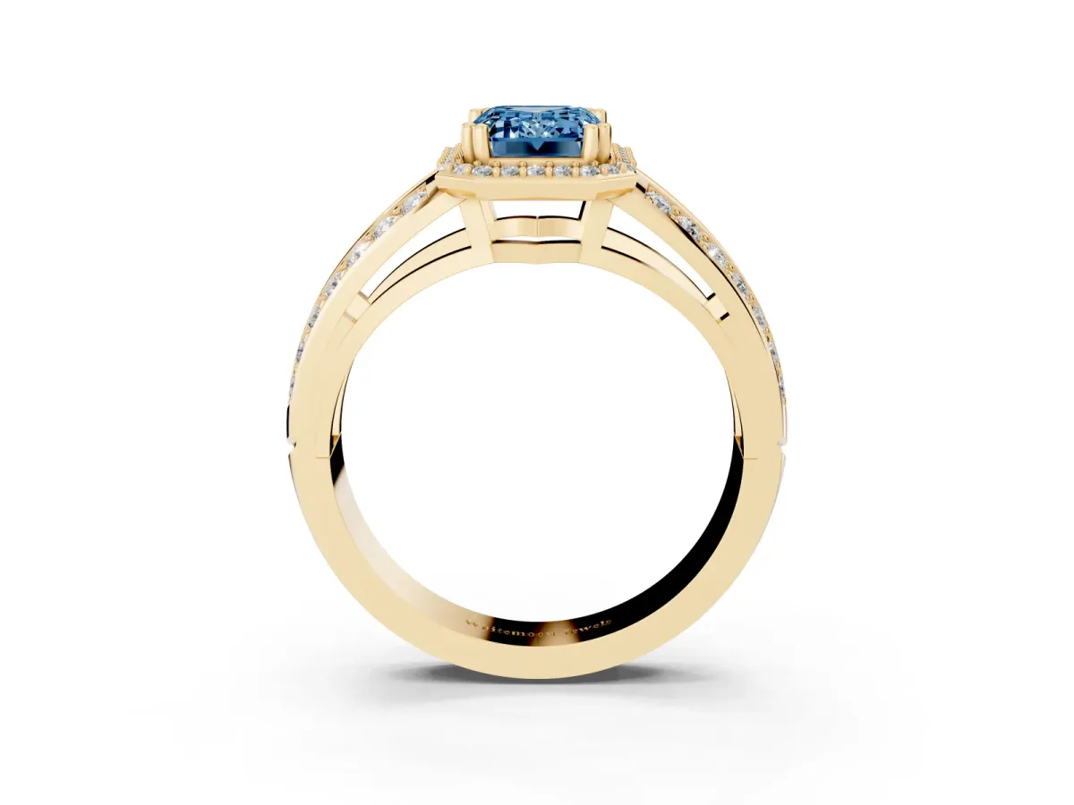 Fancy Blue Emerald Cut Diamond Halo Ring with Split Shank Pavé Band and Four-Prong Setting Yellow gold