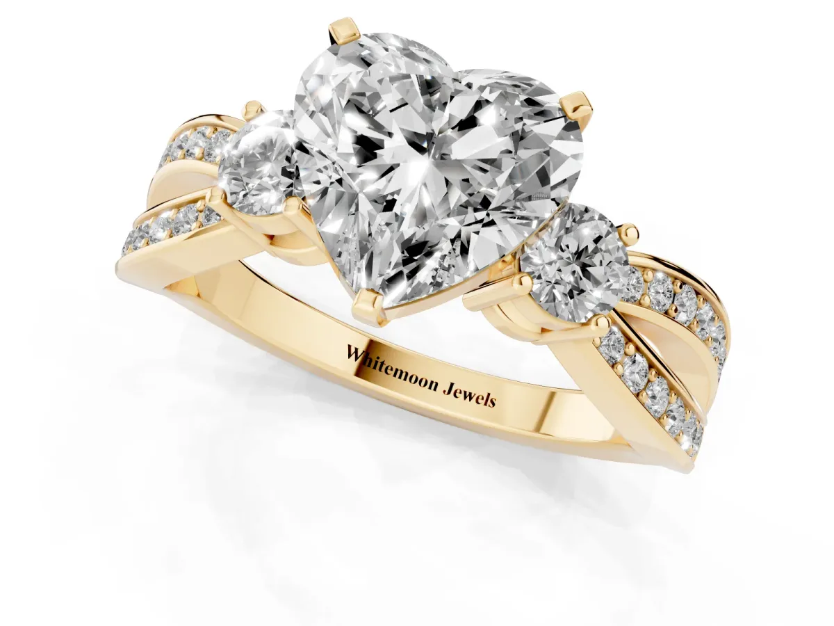 Three-Stone Heart Cut Cut Diamond Twist Band with Prong Setting Yellow gold