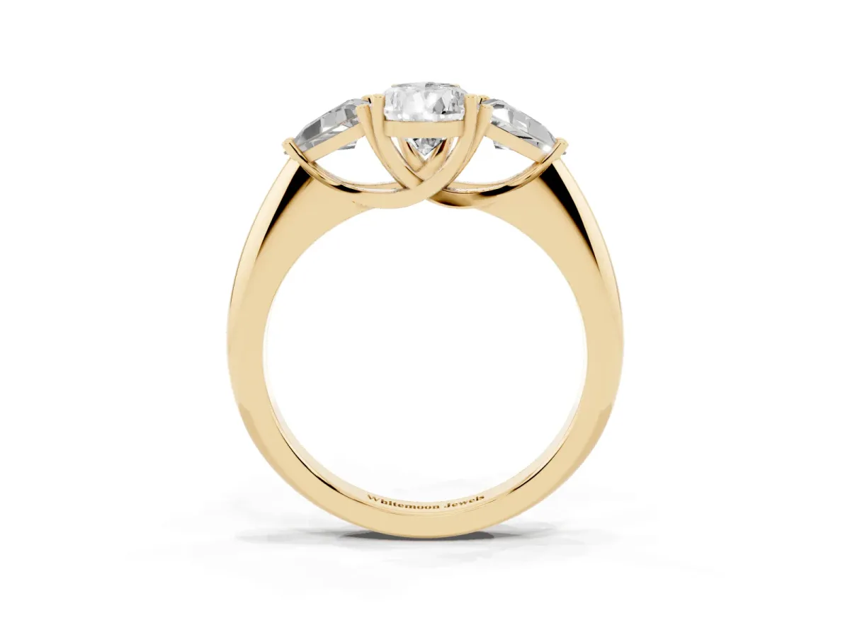 Three-Stone Pear Cut Diamond Engagement Ring with Trillion Side Stones and Prong Setting Yellow gold