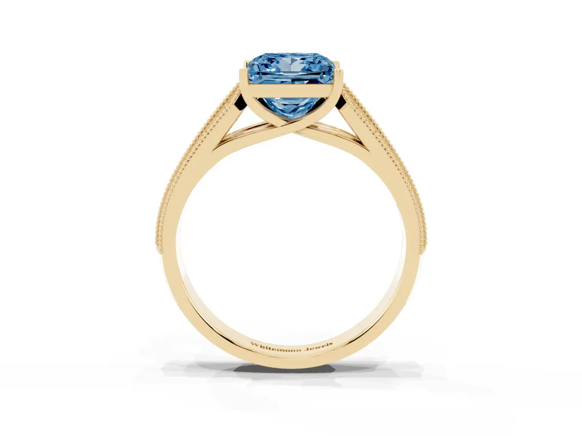Fancy Blue Princess Cut Cut Pave Split Shank Engagement Ring with Four-Prong Setting Yellow gold