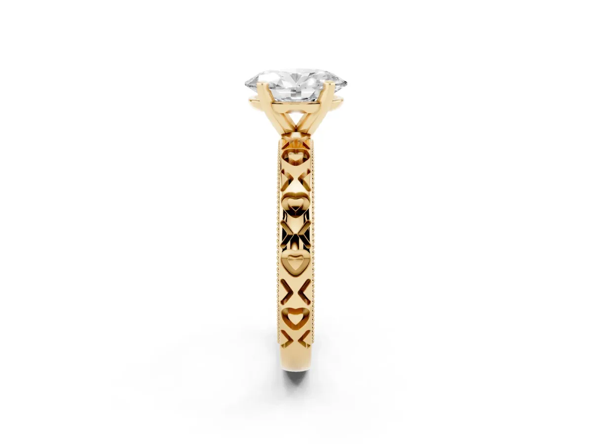 Oval Cut Solitaire Diamond Engagement Ring with XO Engraved Band and Four-Prong Setting Yellow gold