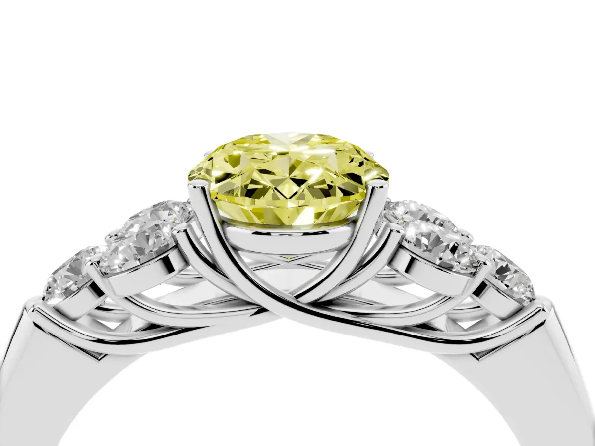 Fancy Yellow Oval Cut Cut Diamond Cluster Ring with Round Accent Stones and Prong Setting on a Classic Band Platinum