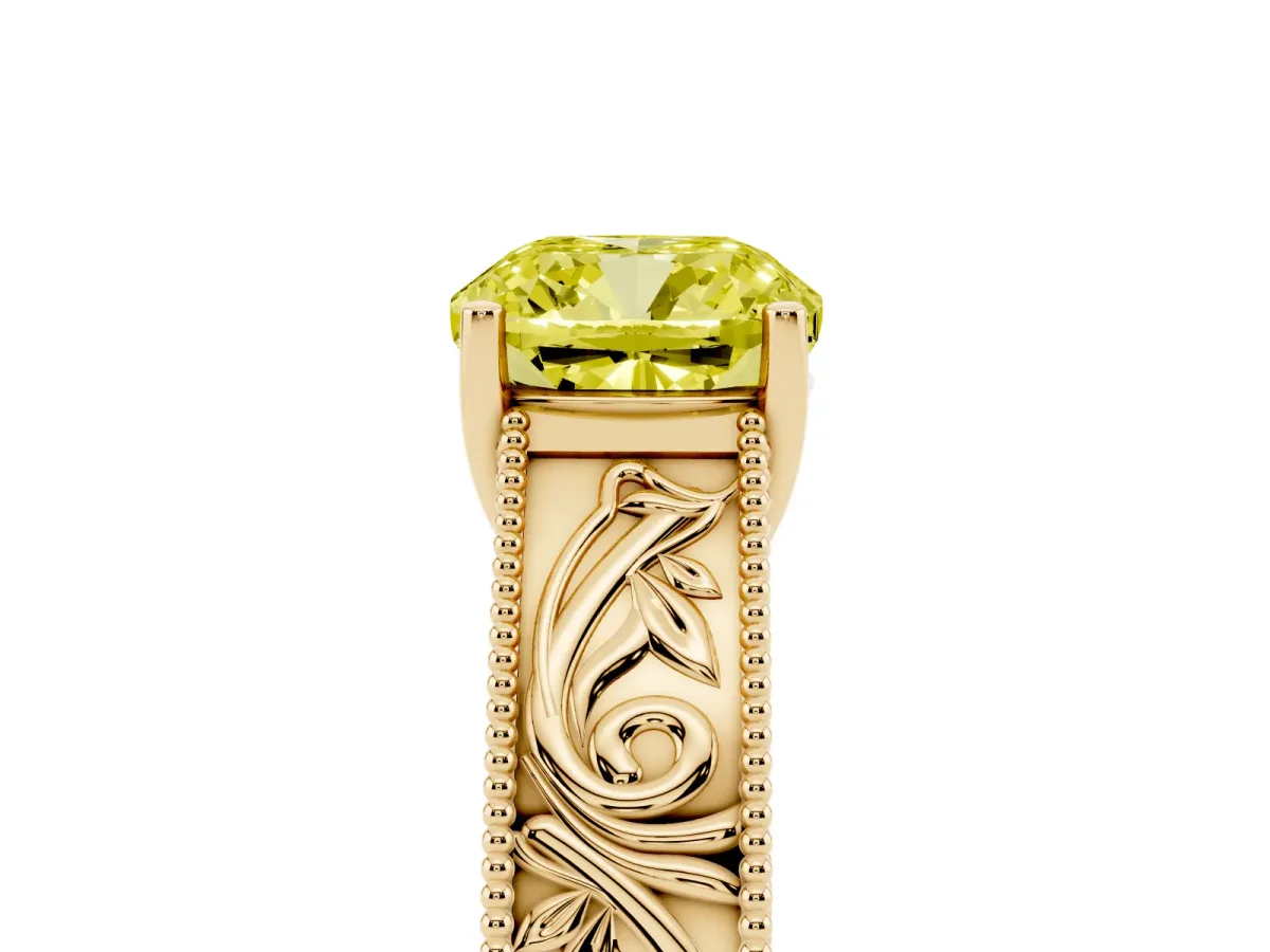 Fancy Yellow Cushion Cut Diamond Solitaire Ring with Engraved Band and Four-Prong Setting Yellow gold