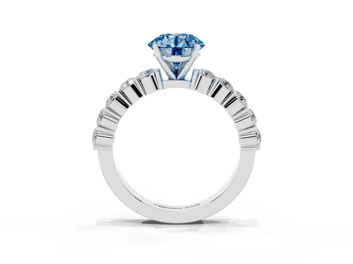 Fancy Blue Round Cut Diamond Solitaire Ring with Shared Prong Round Side Stones Silver